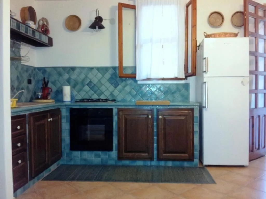Casa de Férias Villa Degli Angeli - Appartamento Portopinetto Porto Pino